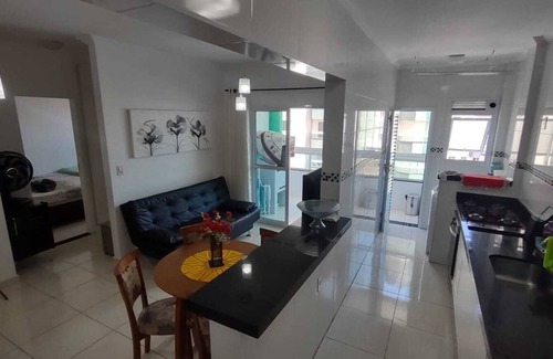 Praia Grande Apartment | Complete apartment with sea view, 1 block from the beach and 1 parking space