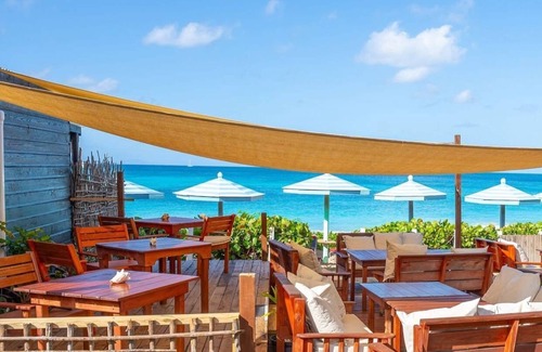 Johnson's Point Hotel | Conch Beach Cabins - Rumbus Beach