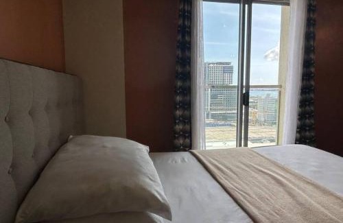 North Reclamation Area Apartment | Condo with Balcony - MIGAs Haven at Sunvida Tower