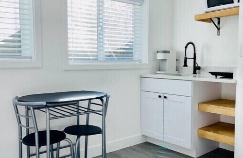 Granite Ridge Apartment | Convenient sunny kitchenette with garage near mountains, lakes, and Highways.