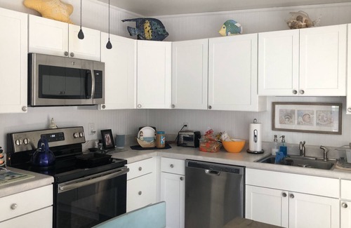 Myrtle Beach RV Rental | Cool beach retreat with large porch for those looking to unwind.