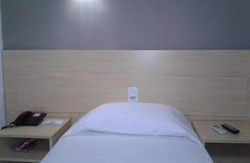Menino Deus Hotel | CORAL EXPRESS Prox PUCRS, 5klm de distancia e Hospitais