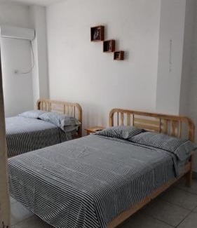 Playas House | Coral, habitación de Flor de Lis Beach House