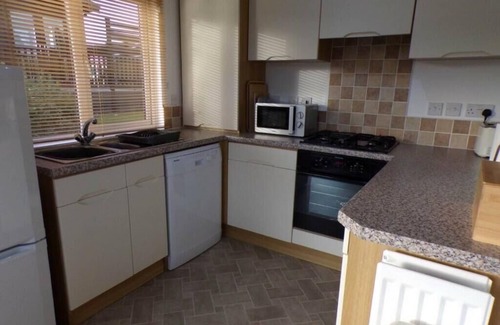 Tintagel Cabin | Cornish Coastal Lodge with hot tub. 2 bedrooms and steps to the coast.