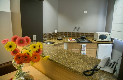 Gonzaga Apartment | Cosmopolitan Praia Flat
