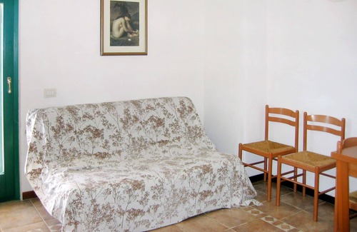 Tanaunella Apartment | Cosy apartment for 4 guests with TV, terrace and parking