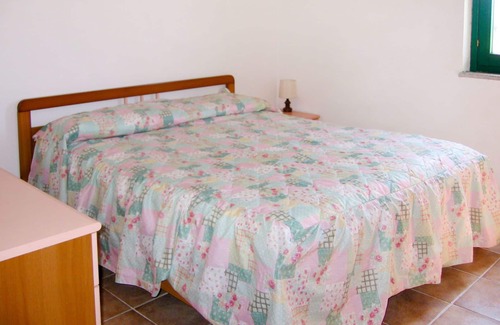Tanaunella Apartment | Cosy apartment for 4 guests with TV, terrace and parking