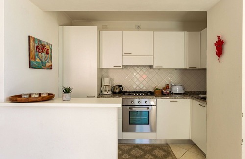 San Carlo Apartment | Cosy apartment for 6 guests with TV, terrace, pets allowed and parking