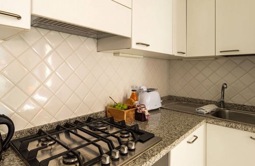 San Carlo Apartment | Cosy apartment for 6 guests with TV, terrace, pets allowed and parking