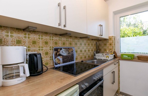 Sehestedt Apartment | Cosy apartment for 4 guests with WIFI, TV, terrace and pets allowed