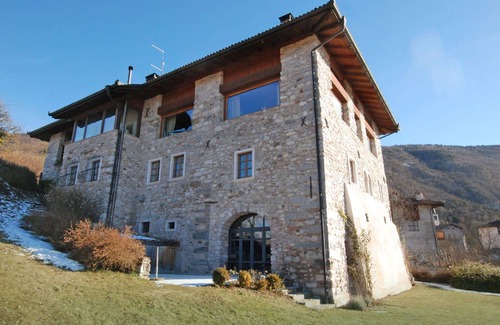 Comano Terme Apartment | Cosy apartment for 4 guests with WIFI, private pool, TV, patio and pets allowed