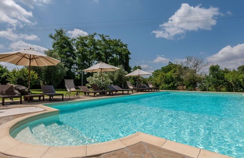 Poggi del Sasso Villa | Cosy apartment in villa for 2 guests with pool, A/C, WIFI, TV, patio and pets allowed