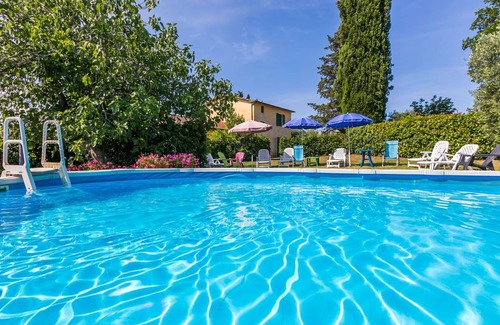 Follonica Villa | Cosy apartment in villa for 6 people with pool, WIFI, TV, patio, pets allowed and parking