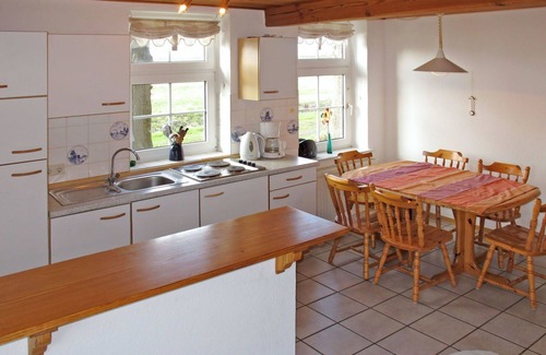 Bunde House | Cosy apartment in villa for 14 guests with WIFI, TV, terrace and pets allowed