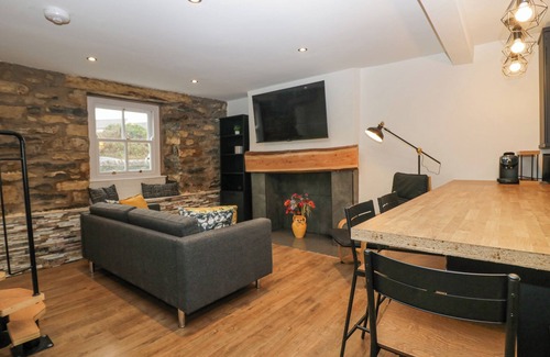Cark Cottage | COSY LOGS COTTAGE, pet friendly, with a garden in Cark In Cartmel