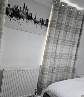 Bolton Apartment | Cosy three bedroom spacious house with parking and Wi-Fi for 7guests