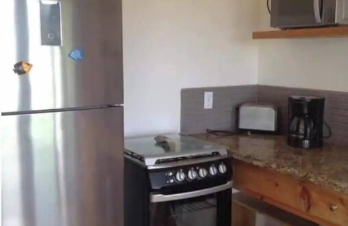 Isla de Utila Cottage | cottage utila hill top trade wind stuning view quiet full furniched