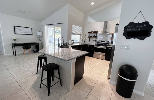 Port Saint Lucie Villa | Cozy 4BR Home w/Solar heated Pool, BBQ, & Bonfire