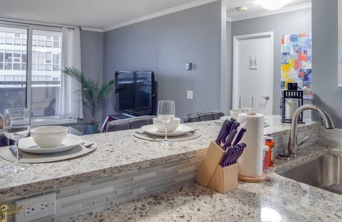 Eau Claire Condo | Cozy and Central DT Home w Gym Coffee Parking BBQ!