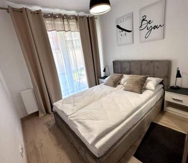 Fabryczna Apartment | Cozy apartment near Magnolia - Private Parking