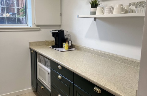 Cedarbrae House | Cozy basement suite w/fireplace. Pet friendly!