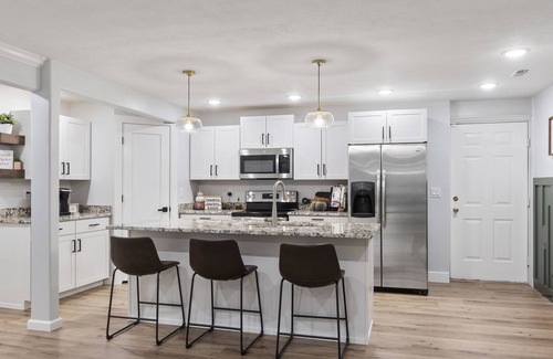 Layton House | Cozy basement with large yard