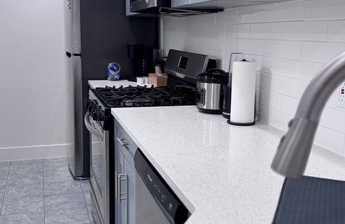 West New York Apartment | Cozy bedroom with attached bathroom 15 ms Manhattan.