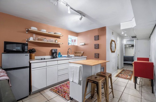 Logan Square Apartment | Cozy & Colorful garden unit in Logan Square