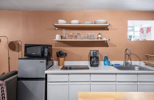 Logan Square Apartment | Cozy & Colorful garden unit in Logan Square