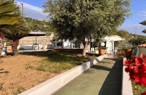 Marina di Fuscaldo Apartment | Cozy cottage with veranda and garden 800 meters from the sea