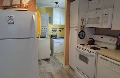 Garden City Cottage | Cozy Cottage open floor plan. 2 bed, 2 full. Free WiFi, Roku and Golf Cart.