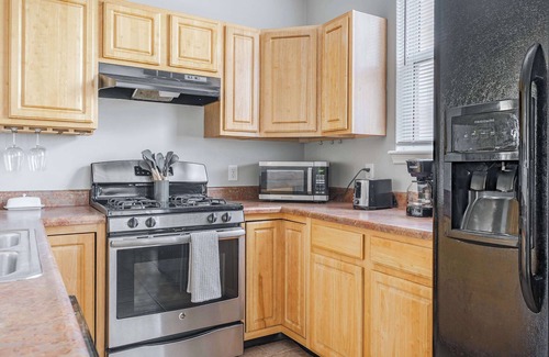 Near Northside House | Cozy Downtown Escape! Hot tub and Modern Touches