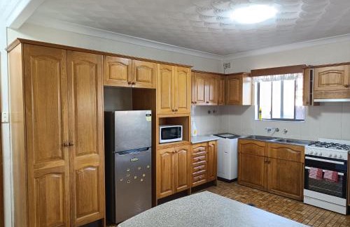 Merrylands House | Cozy Family Room with Private Bathroom in Spacious Home - M8