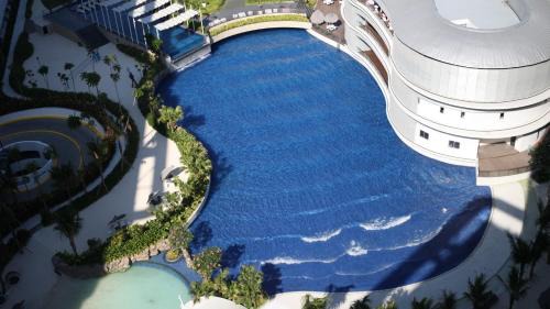 Don Bosco Apartment | Cozy Green 1 BR unit with Balcony Azure Bahamas South
