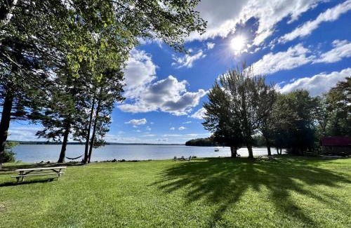 Burnham House | Cozy Lakefront Cabin with Porch, Firepit, Kayaks & Sandy Beach Access in Burnham, Maine