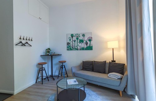 Bad Nauheim Apartment | Cozy-Livings Altbau mit Terrasse und Küche am Stadtpark