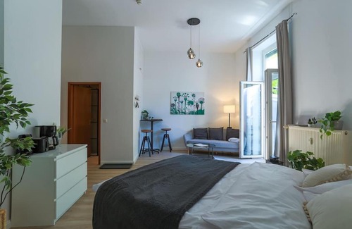 Bad Nauheim Apartment | Cozy-Livings Altbau mit Terrasse und Küche am Stadtpark