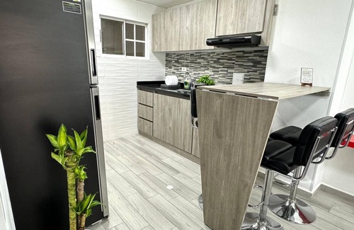 Bucaramanga Apartment | Cozy modern apartment on headboard