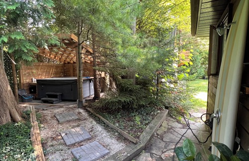 Sauble Beach Cottage | Cozy private beach house with fire pit and hot tub in the heart of Sauble Beach.