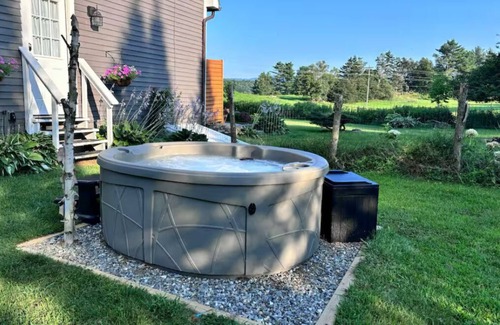 Morristown Apartment | Cozy Retreat with Private HOT TUB & Meadow Views. Near Stowe & Skiing