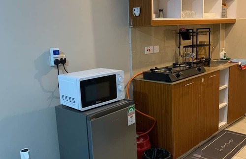 Runda Apartment | Cozy Stay at Bambo Nest, Coral BELLS | Rooftop Pool, Free WiFi, Netflix & More!