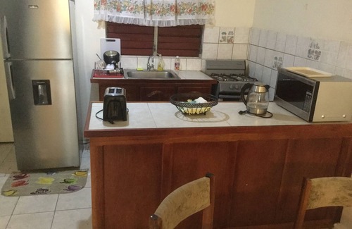 Molynes Gardens House | Cozy town house with two bedrooms that sleeps a maximum of four persons.