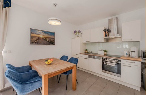Korswandt Apartment | Cozy vacation apartment in Korswandt on the lake with balcony and lake view
