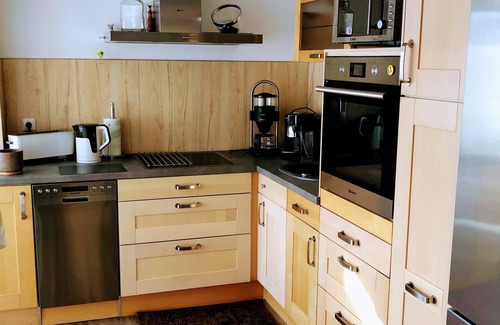 Finsterbergen House | Cozy vacation home with loggia, covered terrace and large garden.