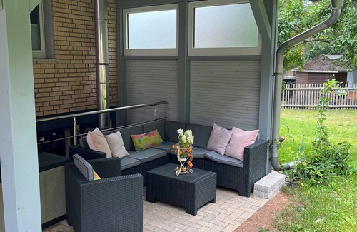 Finsterbergen House | Cozy vacation home with loggia, covered terrace and large garden.