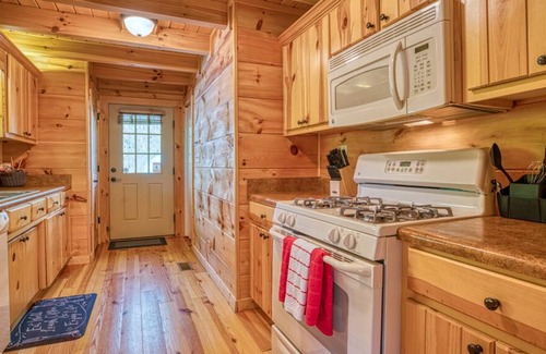 Clearwater Creek Cabin | Cozy, Wood Cabin. Private and with Firepit. Gated community.