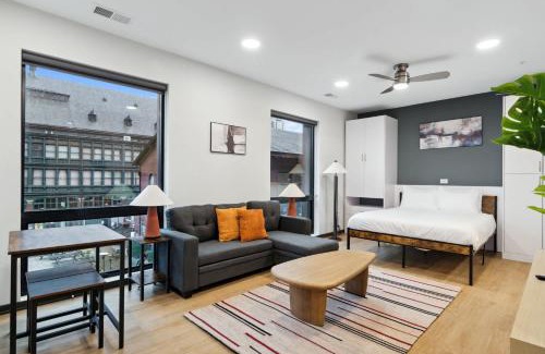 Lockerbie Square Apartment | CozySuites Mass with parking lounge & roof deck #35