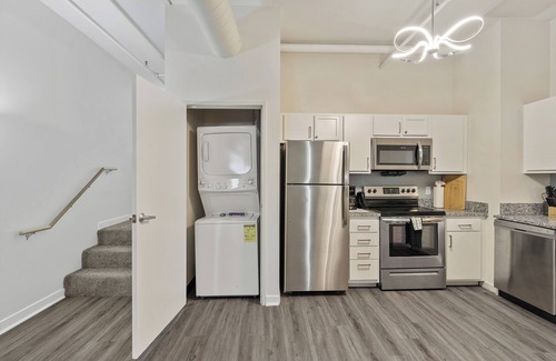 Mile Square Apartment | CozySuites The Block Skybridge Access