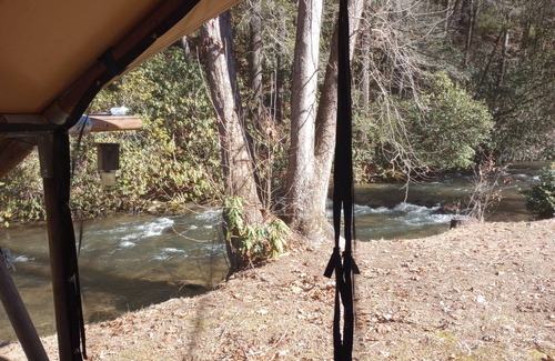 Murphy RV Rental | Creek Front Safari Tent-Furnished, relaxing under the stars, Firepit, Smores.