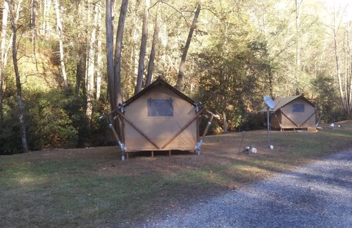 Murphy RV Rental | Creek Front Safari Tent-Furnished, relaxing under the stars, Firepit, Smores.